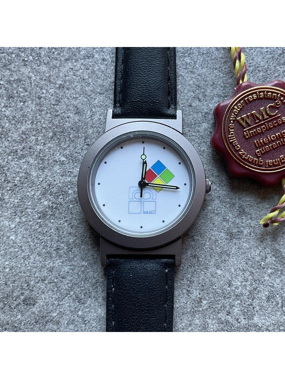 Vintage WMC Watch 31mm Silver Tone Case W/White Dial & Black Leather Band D1